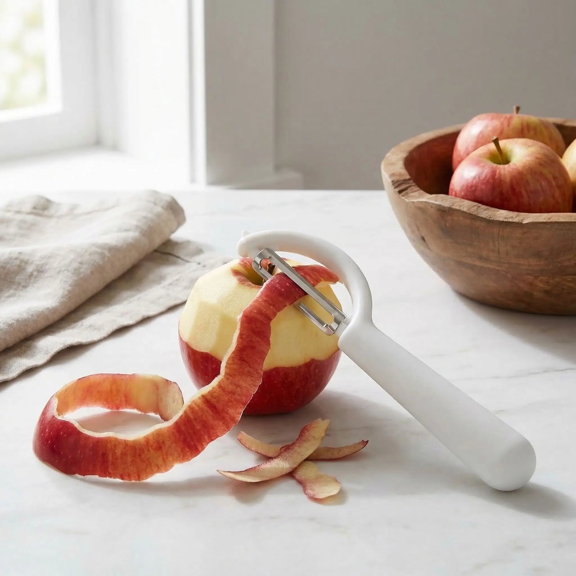 econome eplucheur tranche couleur blanc