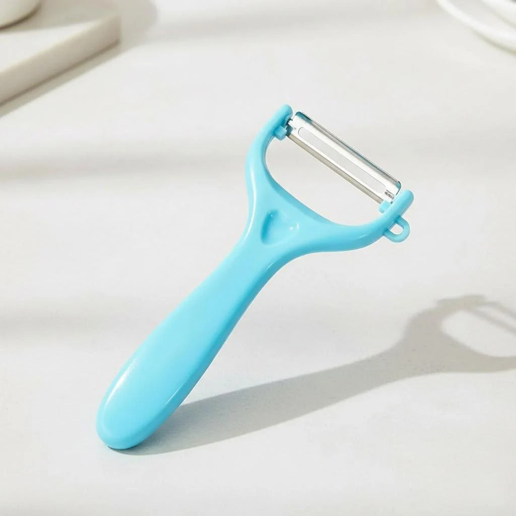 eplucheur econome poignée incurvée bleu