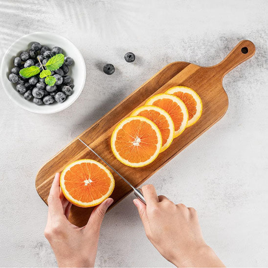 planche bois à découper coupe orange